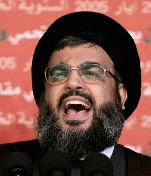 File picture dated 25 May 2005 shows the head of Lebanon's Shiite Muslim movement Hezbollah Sheikh Hassan Nasrallah addressing supporters in Bint-Jbeil, a Shiite town near the Israeli border (AFP)