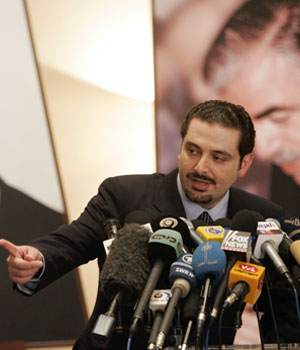 Lebanese anti-Syrian opposition leader gestures during a press conference in his palace in Beirut, Lebanon, 20 June, 2005, (AP)