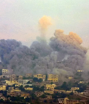 Smoke billows in the town of Khiam, in southern Lebanon,July 28, 2006, after an Israeli attack (AP)