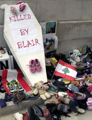 London protesters leave a shrine in protest of the killing of children in Lebanon (Asharq Al-Awsat Photo by Hatim Oweida)