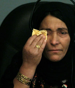 Najeeba Faqe Kheder Soof Ahmed testifies on the second day of the former Iraqi leader Saddam Hussein's trial, for genocide against Kurds in the 1980s, in Baghdad August 22, 2006 (REUTERS)