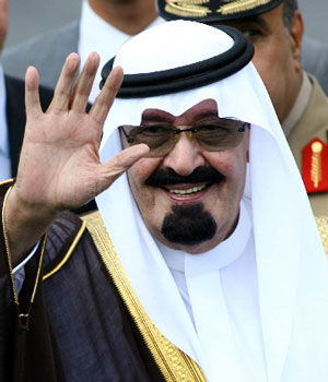 King Abdullah of Saudi Arabia waves after his arrival at Ankara Esenboga airport, 08 August 2006 (AFP)