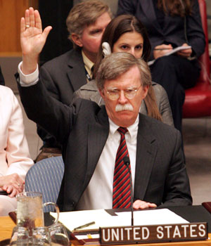 The U.S. ambassador to the United Nations, John Bolton, votes during  a Security Council meeting on the situation in Sudan, Aug. 31, 2006 at the U.N. headquarters (AP)