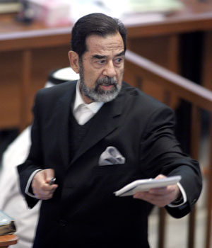 Former Iraqi President Saddam Hussein testifies during his trial on genocide charges at the fortified Green Zone in Baghdad, 14 September 2006 (AFP)