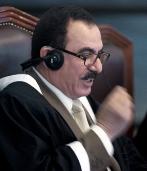 Chief judge Abdullah al-Amiri addresses the court during the trial of former Iraqi President Saddam Hussein at the fortified Green Zone in Baghdad, Iraq, Sept. 14, 2006. (AP)