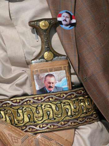 A guest President of Yemen Ali Abdallah Saleh has his picture on his dagger at a campaign rally in Damar, 90 kms south of Sana'a (EPA)
