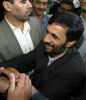 Iranian President-elect Mahmood Ahmadinejad greets Iranians (AFP)