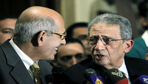 Former director of the U.N.'s nuclear agency and Nobel peace laureate, Mohamed El Baradei, speaks with former Egyptian Foreign Minister and presidential candidate, Amr Moussa in Cairo, Egypt. (AP)