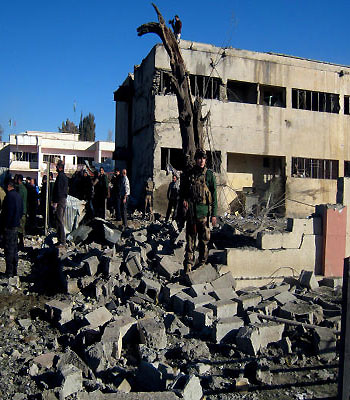 Security forces inspect the local headquarters of the Kurdistan Democratic Party after a bomb attack in Kirkuk, 180 miles (290 kilometers) north of Baghdad, Iraq. (AP)