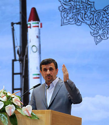 A handout picture released by the Iranian presidency website shows President Mahmoud Ahmadinejad speaking during a ceremony to mark Iran's National Day of Space Technology in Tehran. (AFP)