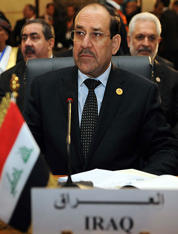 A handout picture released by the Iraqi prime minister's office shows Iraqi Premier Nuri al-Maliki attending the 12th summit of the Organisation of Islamic Cooperation (OIC) in Cairo on February 6, 2013. (AFP)