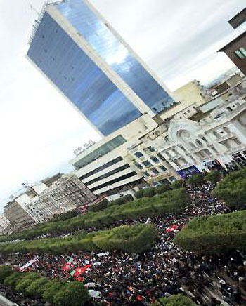 An overview shows Tunisian Ennahda party supporters as they take part in a rally to show support for the ruling Islamist party, in which the Ennahda-dominated coalition holds a majority. (AFP)