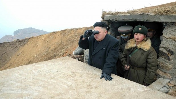 North Korean leader Kim Jong-un views South Korean islands during a visit to a military unit on a western island bordering South Korea on March 7, 2013. Source: EPA/YONHAP