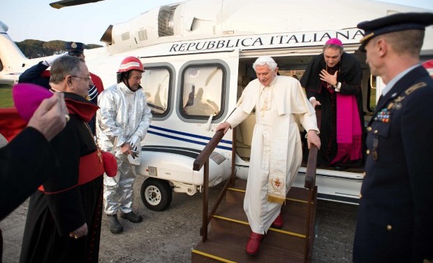 Pope Benedict XVI arrives by helicopter at the papal summer residence at Castelgandolfo, south of Rome, February 28, 2013.(REUTERS/Osservatore Romano)