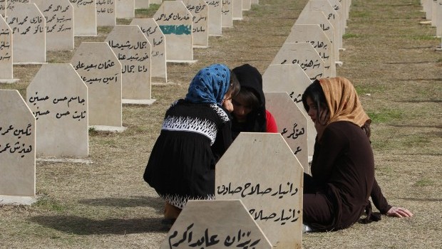 Iraqi Kurd residents visit the cemetery for victims of the 1988 chemical attack in the Kurdish town of Halabja, near Sulaimaniya, 260 km (160 miles) northeast of Baghdad, March 16, 2013. Source: Reuters/Thaier al-Sudani