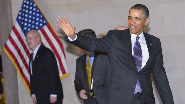 US President Barack Obama waves as he makes his way to meet with the House Democratic Caucus on March 14, 2013. Source: TOPSHOTS/AFP PHOTO/Mandel NGAN
