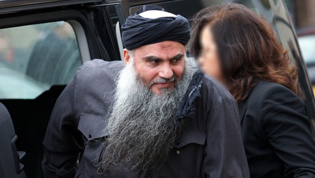 In this file picture taken on November 13, 2012 terror suspect Abu Qatada arrives at his home in northwest London, after he was released from prison. (AFP Photo)