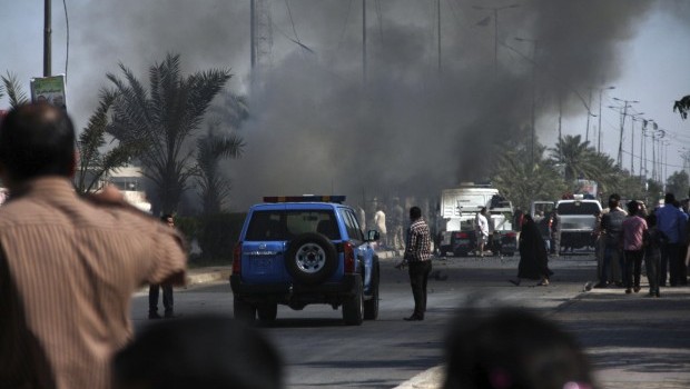 Smoke rises from the site of a bomb attack in Baghdad's Sadr City March 19, 2013. Source: REUTERS/Wissm al-Okili