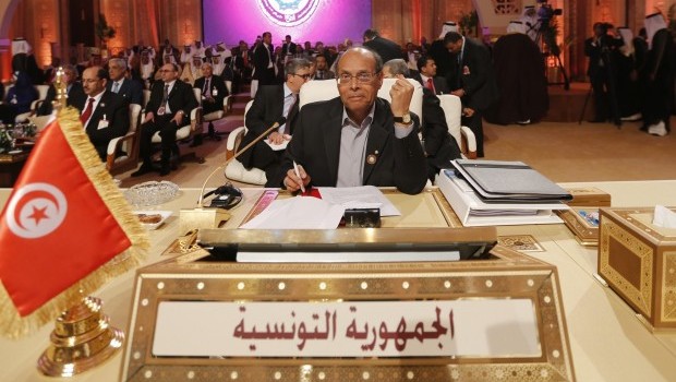 Tunisia's president, Moncef Marzouki, looks on during the opening of the Arab League summit in Doha on March 26, 2013. (REUTERS)