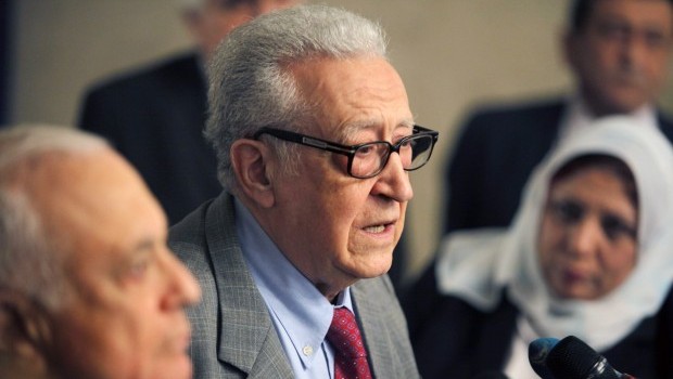 UN–Arab League Syria mediator Lakhdar Brahimi speaks during a press conference with Arab League Secretary-General Nabil Al-Araby, left, at the Arab League headquarters in Cairo, Egypt on Monday, March 18, 2013. (AP Photo/Amr Nabil)