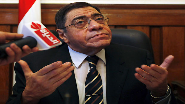 File photo of Egypt's prosecutor-general Abdel Maguid Mahmoud speaking to reporters in his office in the High Court in Cairo. (REUTERS/Amr Abdallah Dalsh/Files)
