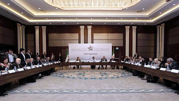 Syrian Opposition Coalition members and Syrian National Coalition members attend a meeting in Istanbul. (AP)