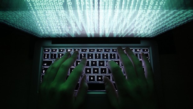 A man types on a computer keyboard in this February 28, 2013 illustration file picture. REUTERS/Kacper Pempel/Files