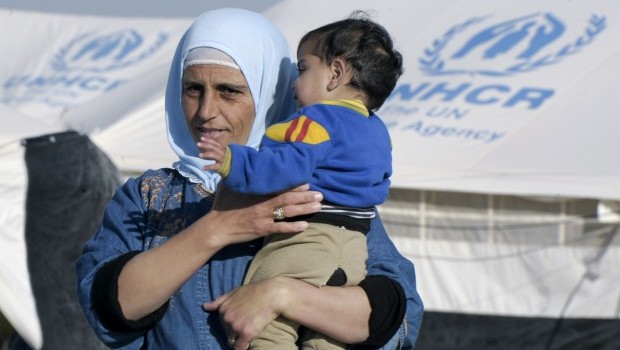 A woman and child at Za'atari refugee camp, near Mafraq, Jordan, in December 2012. UN Photo/Mark Garten