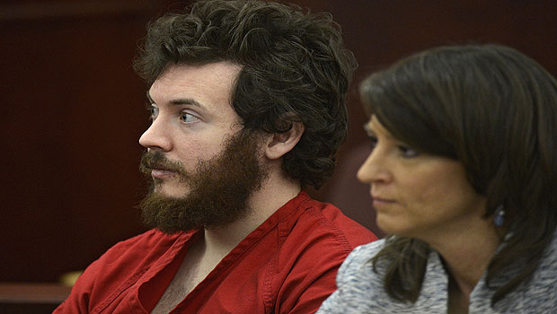 James Holmes and defense attorney Tamara Brady appear in district court in Centennial, Colorado for his arraignment, March 12, 2013. Source: AP Photo/The Denver Post, RJ Sangosti, Pool, File)