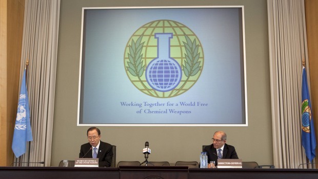 UN Secretary-General Ban Ki-moon [left] speaks at the headquarters of the Organization for the Prohibition of Chemical Weapons in The Hague, Netherlands, on Monday, April 8, 2013. (AP Photo/Jan-Joseph Stok)