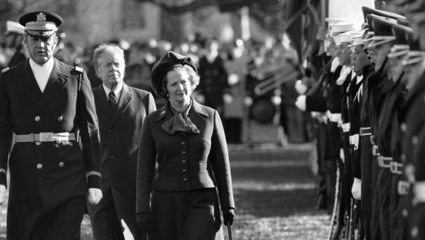 In this Dec. 17, 1979 file photo, British Prime Minister Margaret Thatcher reviews the honor guard at the White House in Washington, as President Jimmy Carter follows. Source: AP Photo