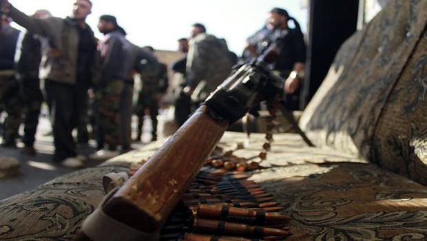 Free Syrian Army fighters get prepared ahead of an infiltration operation in Aleppo's neighborhood of Salaheddine. (R)