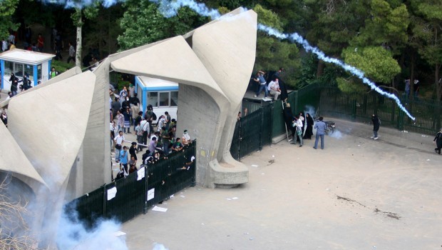 Iranian students avoid teargas at Tehran University during the protests surrounding the 2009 Iranian presidential elections, Sunday, June 14, 2009. Source: AP Photo