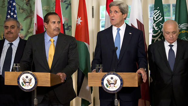Secretary of State John Kerry, with Qatar's Prime Minister and Foreign Minister Hamad bin Jassim bin Jabr Al-Thani, and Arab League Secretary-General Nabil Elaraby. (AP)