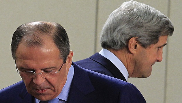 US secretary of state John Kerry (R) walks behind Russian foreign minister Sergey Lavrov (L) at the start of a NATO–Russia foreign ministers meeting at the alliance's headquarters in Brussels on April 23, 2013. (REUTERS/Yves Herman)