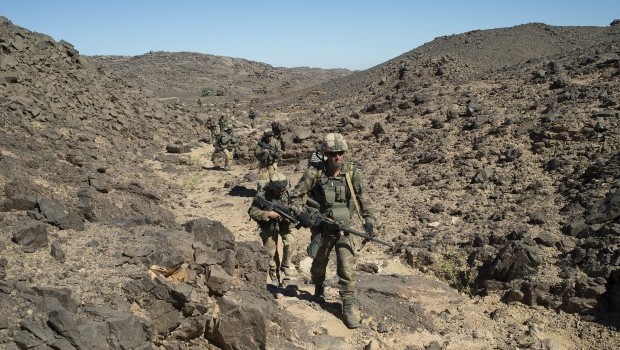 This March 8, 2013 photo provided by the French Army Communications Audiovisual Office (ECPAD) shows French soldiers patrolling the Mettatai region in northern Mali. Source: AP Photo/ECPAD/Arnauld Roine