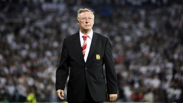 Manchester United manager Alex Ferguson walks before their Champions League soccer match aganist Besiktas at the Inonu Stadium in Istanbul in this September 15, 2009 file photo. (REUTERS/Osman Orsal/Files)