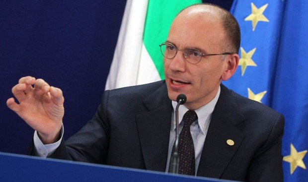 Italy's Prime Minister Enrico Letta addresses the media at the end of an EU summit in Brussels on Wednesday, May 22, 2013. (AP Photo/Yves Logghe)