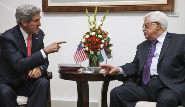 U.S. Secretary of State John Kerry, left, meets with Palestinian President Mahmoud Abbas in the West Bank city of Ramallah, Thursday, May 23, 2013. (AP Photo/Jim Young, Pool)