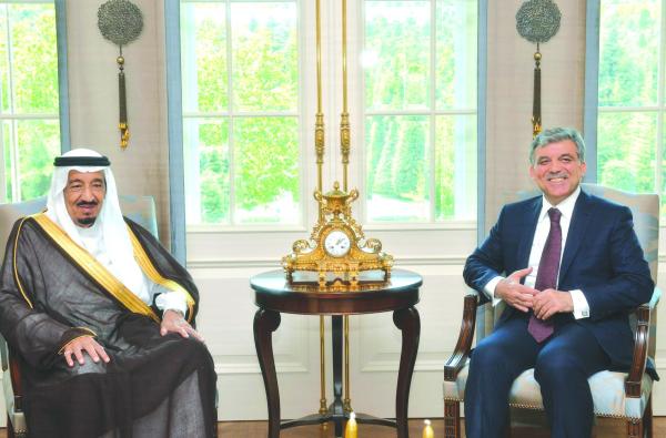 In this photo provided by Turkish Presidency Press Service, President Abdullah Gul, right, and Salman bin Abdulaziz Al Saud, the Crown Prince, First Deputy Prime Minister and Minister of Defence of Saudi Arabia, pose for cameras before their talks at the Cankaya Palace in Ankara, Turkey, Tuesday, May 21, 2013.(AP Photo/Murat Cetin Muhurdar)
