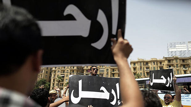 Egyptian protesters shout anti-President Mohammed Mursi and anti-Muslim Brotherhood slogans during a protest in Tahrir Square, in Cairo, Egypt, Friday, May 24, 2013.(AP)