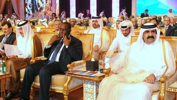 The emir of Qatar, Sheikh Hamad bin Khalifa al-Thani (right), and other officials attend the opening of the Doha Forum, an international meeting which will discuss regional political, economic and social issues of the Arab Spring,  in the Qatari capital on May 20, 2013. Source: AFP Photo/STR