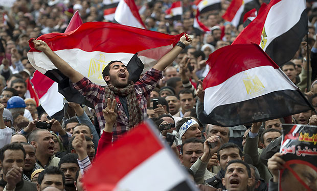 Egyptian anti-goverment demonstrators wave Egyptian flags at Cairo's Tahrir Square on February 10, 2011 on the 17th day of protests against President Hosni Mubarak's regime. Thousands more Egyptian demonstrators joined a mounting tide of protest against Mubarak's regime despite stark threats of a government crackdown. (PEDRO UGARTE/AFP/Getty Images)