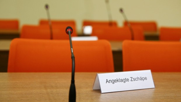 A tag reading 'Defendant Zschaepe' is pictured in the court before the trial of Beate Zschaepe, a member of the neo-Nazi group National Socialist Underground (NSU), in Munich May 6, 2013. The trial of the only surviving member of the NSU, blamed for a series of racist murders that scandalised Germany and shamed its authorities, began on Monday. (REUTERS/Michael Dalder)