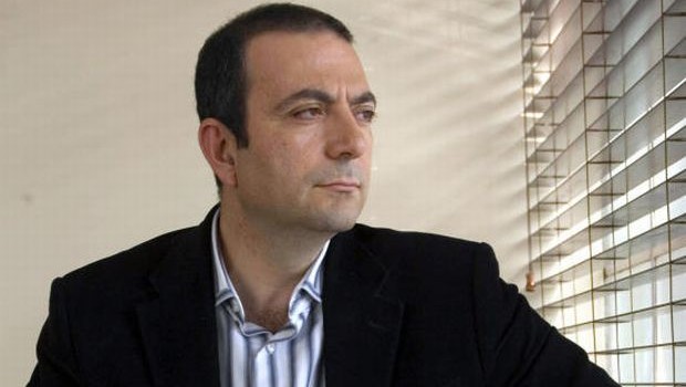 This Jan. 31, 2006 file photo shows Hany Abu-Assad, director of the Oscar nominated Palestinian film "Paradise Now," posing for a photo at Warner Bros. Studios in Burbank, Calif. Abu-Assad is also director of “Omar,” one of the more buzzed-about films at the 2013 Cannes Film Festival. (AP Photo/Damian Dovarganes, file)