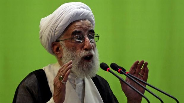 Senior Iranian cleric Ayatollah Ahmad Jannati, secretary of the Guardian Council, Iran's constitutional watchdog, delivers a sermon at Friday prayers, at Tehran University, in Tehran, Iran, Friday, May 17, 2013. (AP Photo/Vahid Salemi)