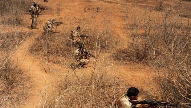 Malian soldiers take positions during a training session given by soldiers from Luxembourg in Koulikoro May 7, 2013. (REUTERS)