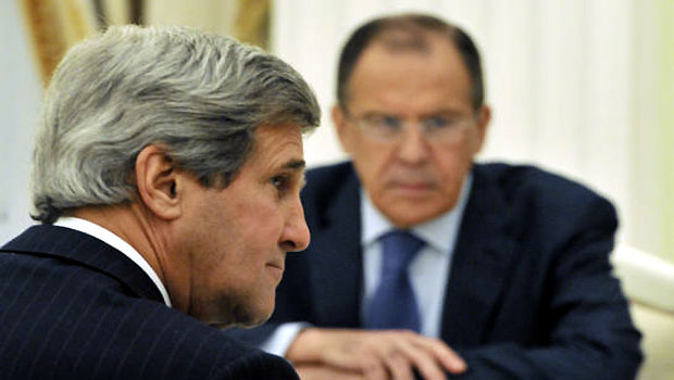U.S. Secretary of State John Kerry, left, and Russian Foreign Minister Sergey Lavrov take part in the talks with Russian President Vladimir Putin in the Kremlin in Moscow.(AP)