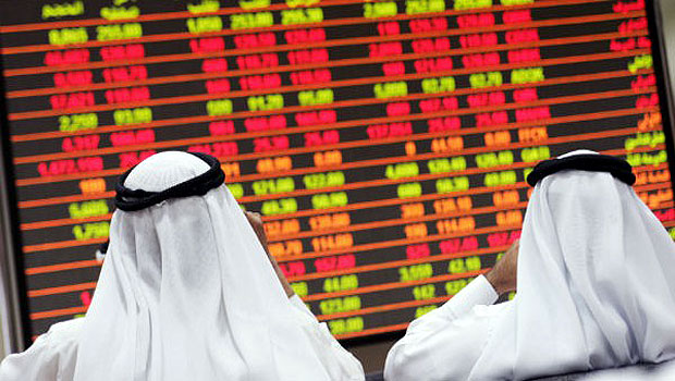 Traders at the Qatar Exchange. (Reuters)