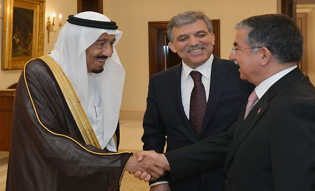 In this photo provided by Turkish Presidency Press Service, President Abdullah Gul, center, watches as Salman bin Abdulaziz Al Saud, the Crown Prince,  left, shakes hands with Turkey's Defense Minister Ismet Yilmaz before their talks at the Cankaya Palace in Ankara, Turkey, Tuesday, May 21, 2013. (AP Photo/Murat Cetinmuhurdar)